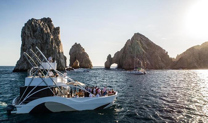 pelicano-los-cabos-boat-sunset